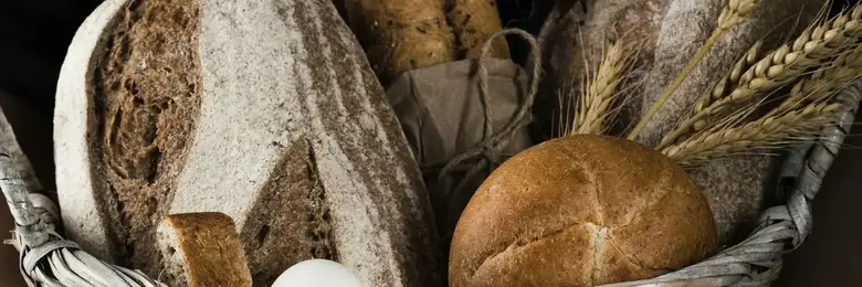 Fresh loaves in a wicker basket